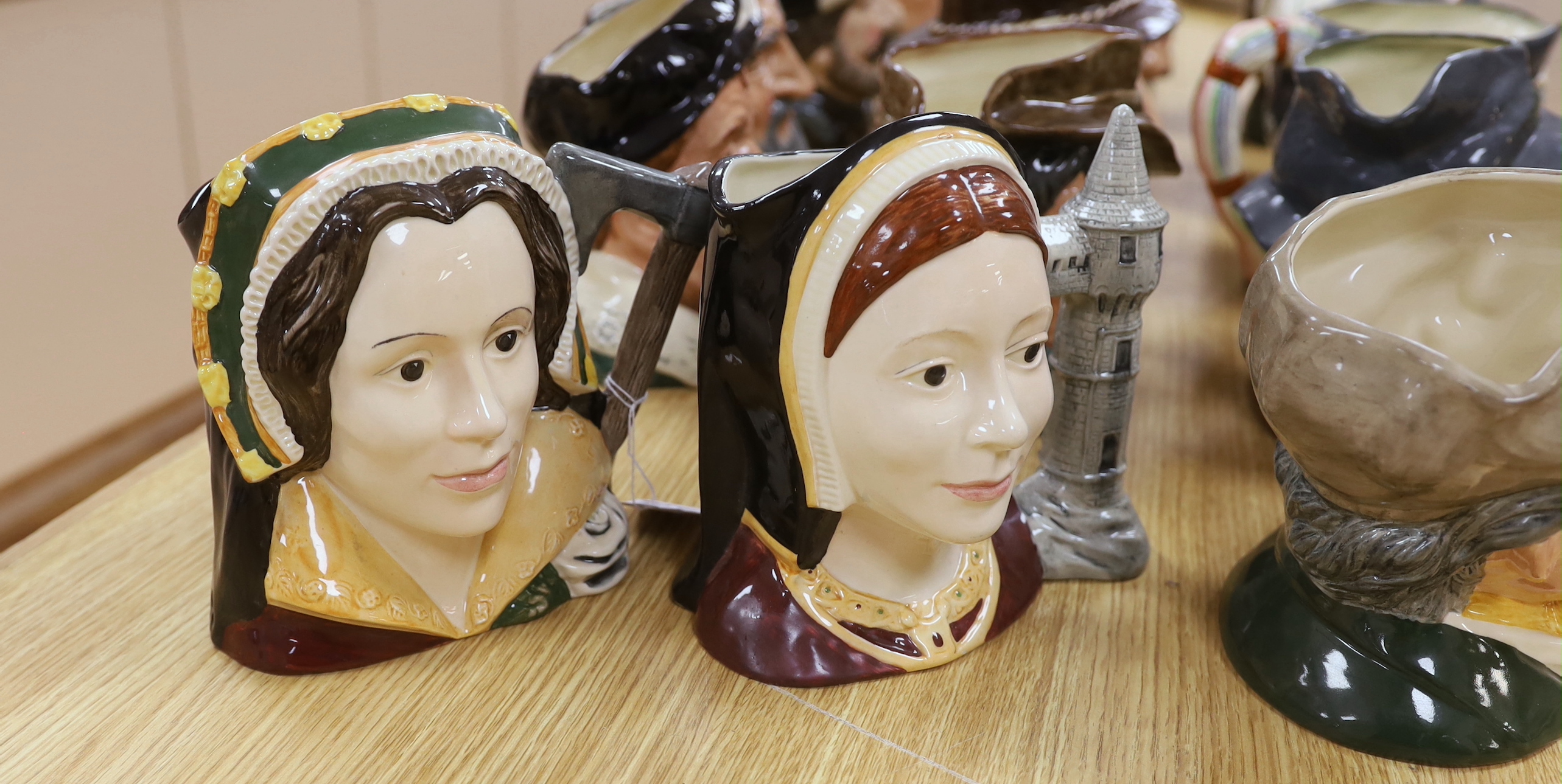 Fifteen Royal Doulton character jugs including Henry VIII D6642, Catherine Howard D6645, Sir Francis Drake D6805, etc., highest 18cm